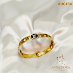 Black stainless steel bracelet accented with gold LV